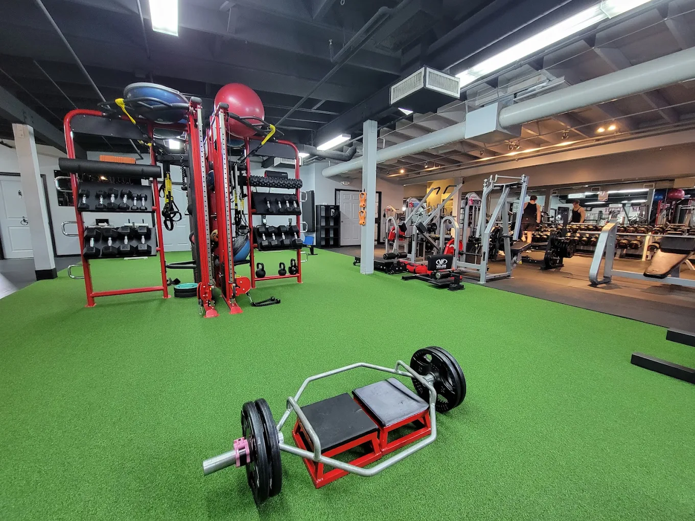 Weight rack and platform area at MuscletopiaUSA
